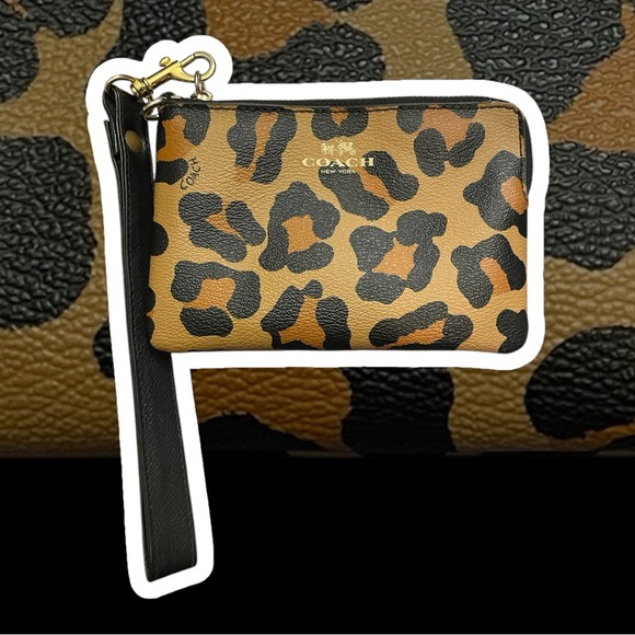 Coach Handbags - EUC Coach Vintage Leopard Print Wristlet